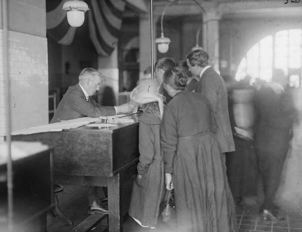 Immigrants being processed through Ellis Island