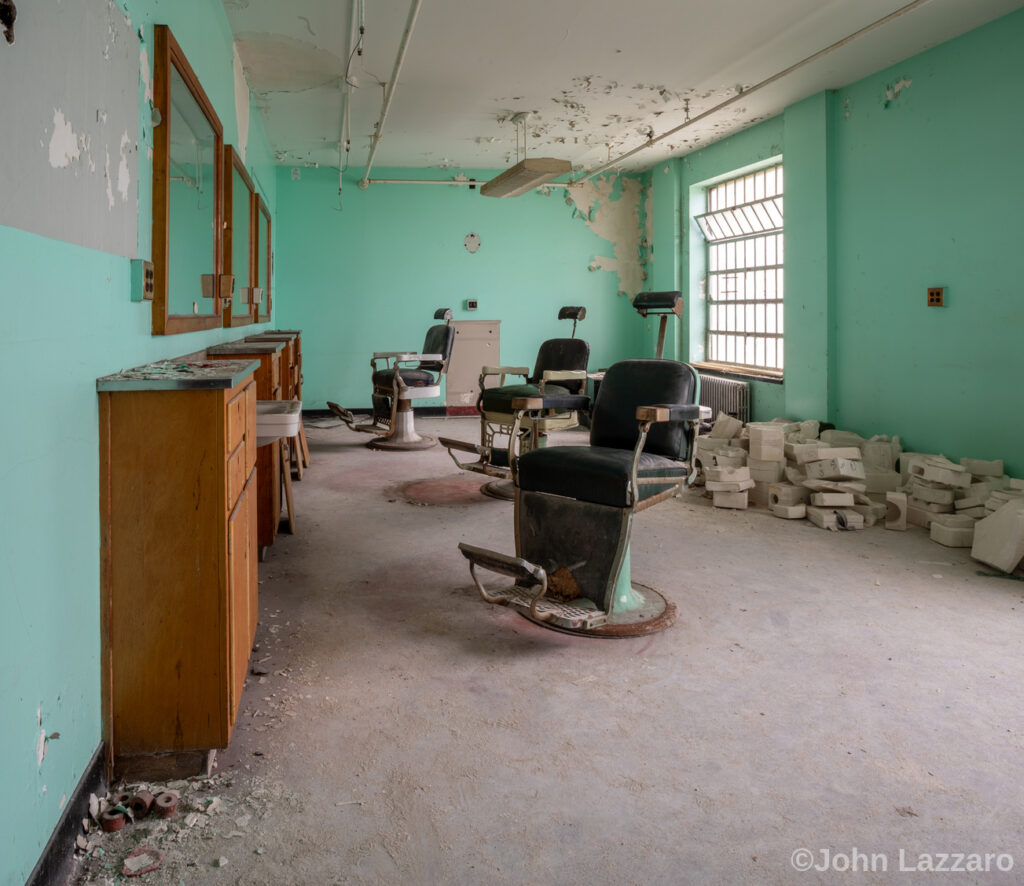Barbershop chairs in a room at the former Buffalo State Hospital
