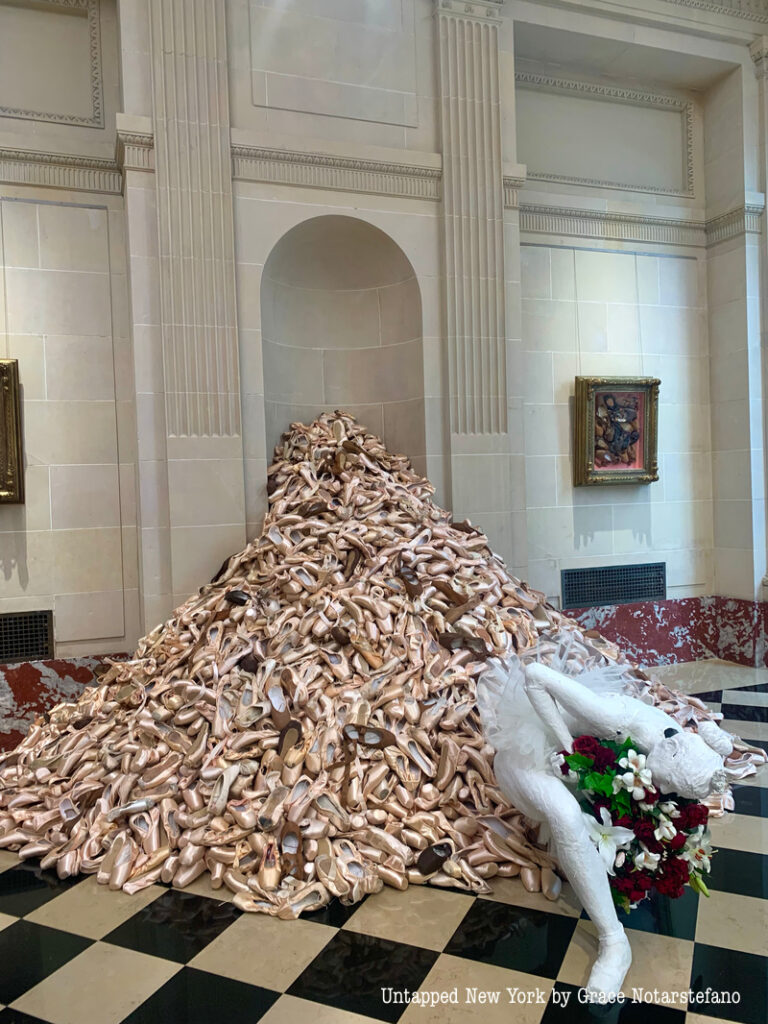 Heaping pile of pointe shoes.