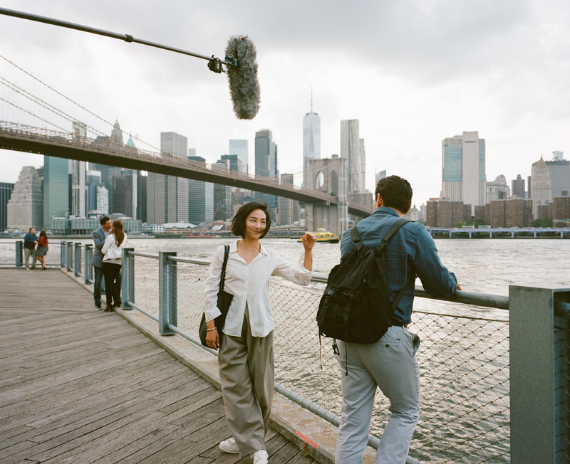 Behind the scenes shot from Past Lives at the Brooklyn Bridge
