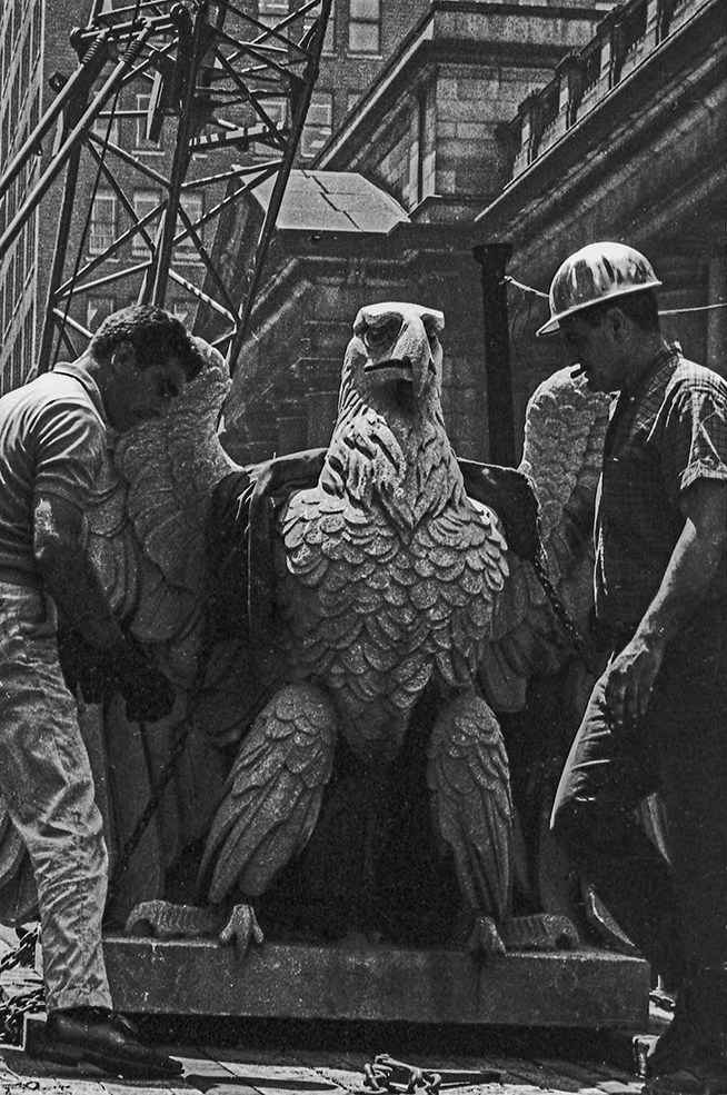 Removal of eagle statue from Penn Station. Photograph by Norman McGrath. 