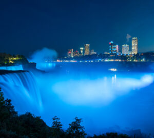 Niagara falls lit up in blue