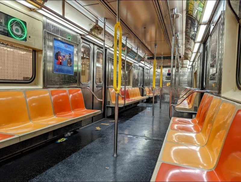 Orange subway seats on 6 train