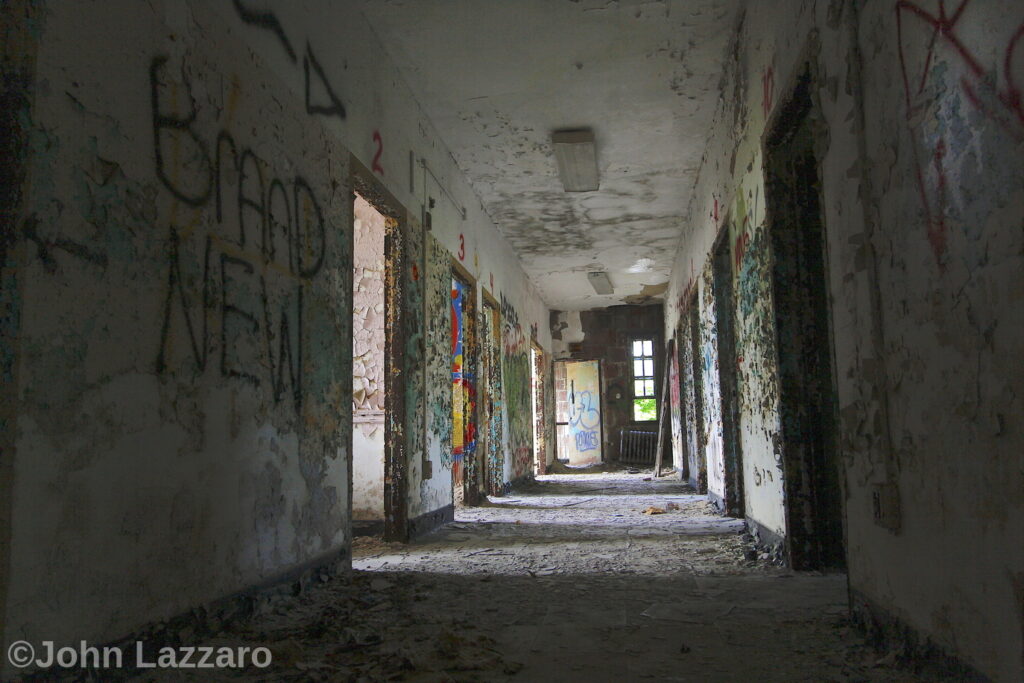 Abandoned graffiti filled hallway of Kings Park